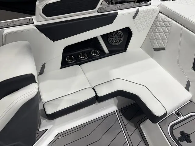Slide: The Image of Luxurious interior of 2025 Nautique Super Air Nautique GS20 boat with sleek seating. - 10