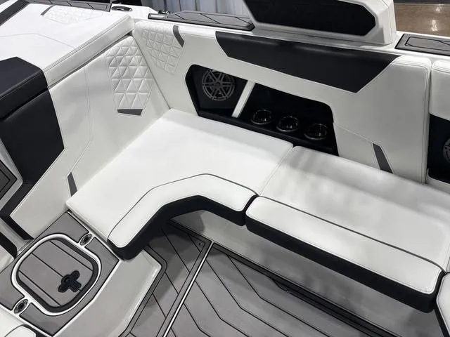 Slide: The Image of Interior of 2025 Nautique Super Air Nautique GS20 boat with sleek seating and modern design. - 11