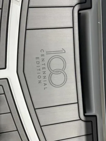 Slide: The Image of 2025 Nautique Super Air Nautique GS20 Centennial Edition logo on sleek surface. - 6