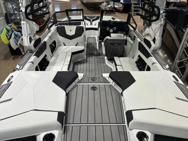 Slide: The Image of 2025 Nautique Super Air Nautique GS20 interior with sleek seating and modern design. - 7