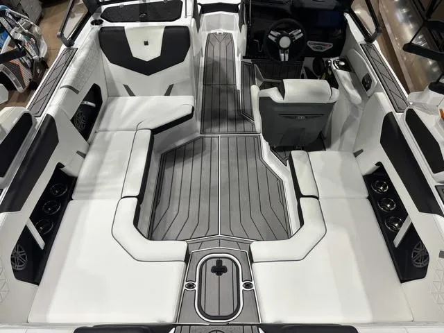 Slide: The Image of 2025 Nautique Super Air Nautique GS20 interior with sleek seating and modern design. - 8