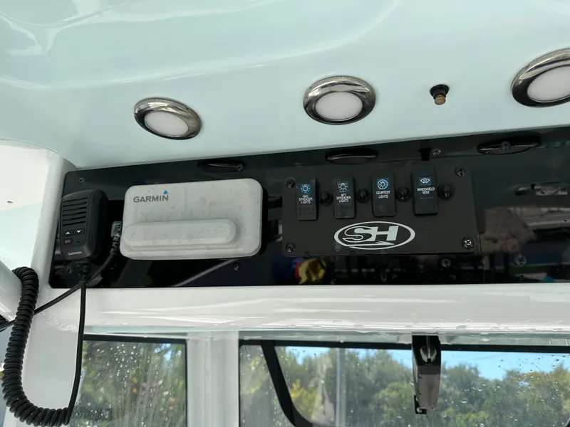 Slide: The Image of Control panel of 2019 Sea Hunt Ultra 255 SE boat with Garmin device. - 8