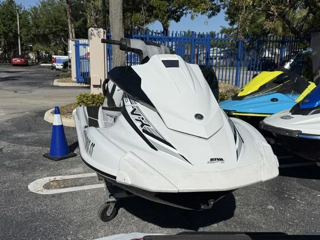 Slide: The Image of 2020 Yamaha WaveRunner VX jet ski parked outdoors on pavement. - 3