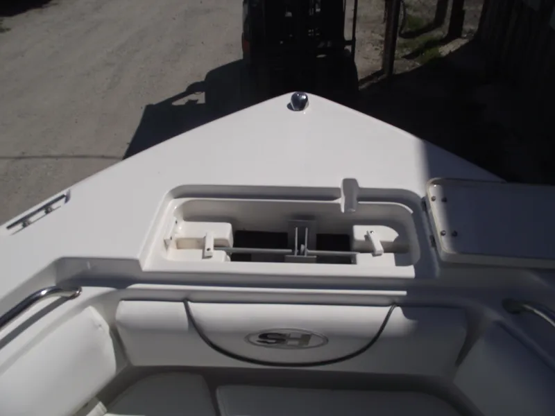 Slide: The Image of 2017 Sea Hunt Ultra 211 boat bow with storage compartment. - 4