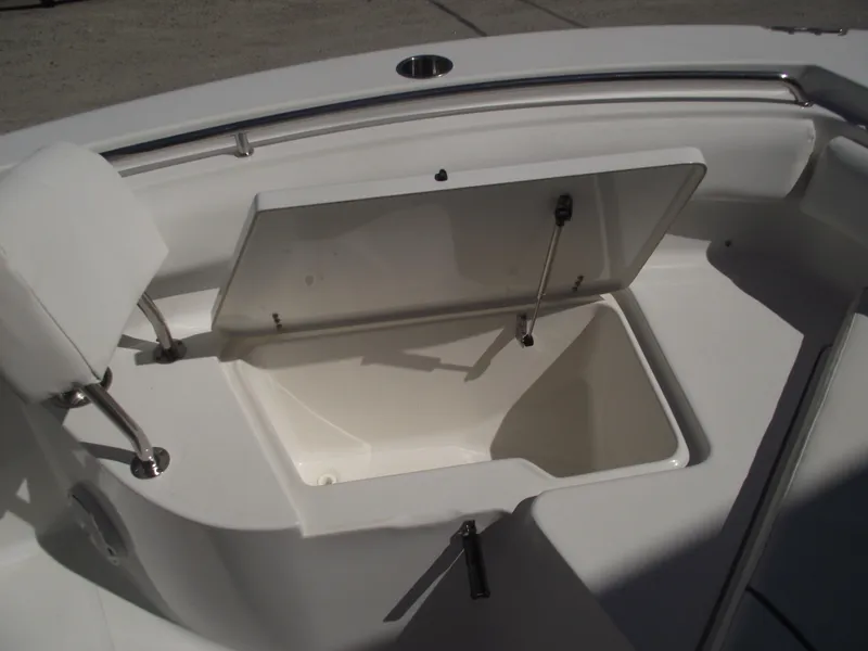 Slide: The Image of 2017 Sea Hunt Ultra 211 boat storage compartment open on deck. - 8