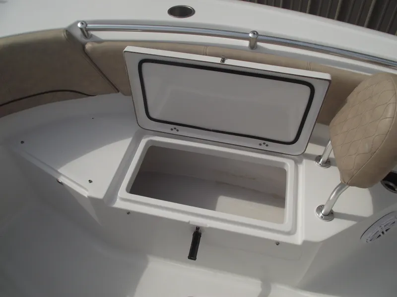 Slide: The Image of 2019 Sportsman Open 232 Center Console boat with open storage compartment. - 12
