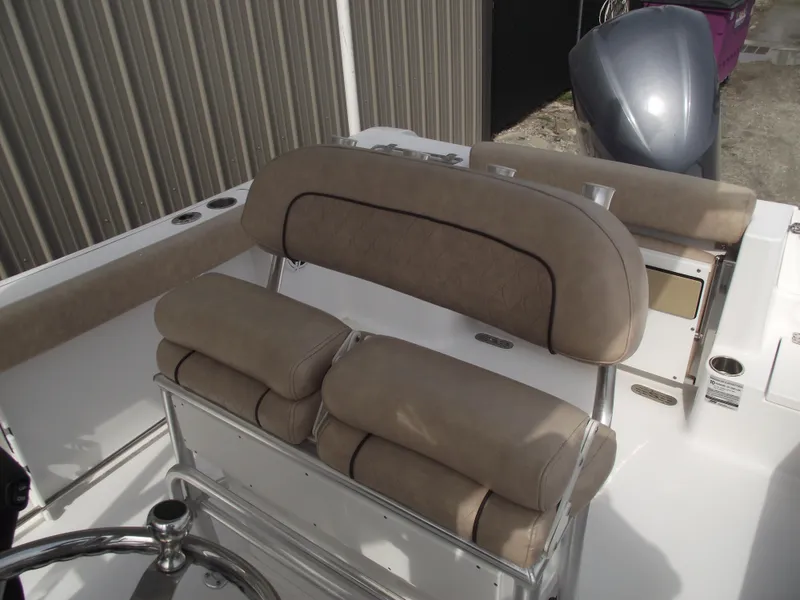 Slide: The Image of 2019 Sportsman Open 232 Center Console boat seating and helm area. - 27