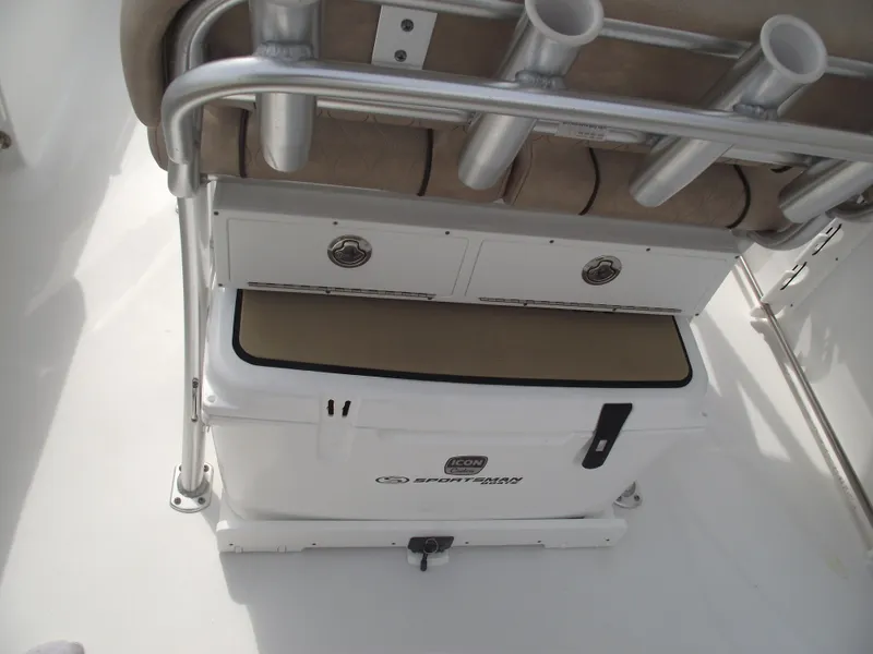 Slide: The Image of 2019 Sportsman Open 232 Center Console boat seating and storage area. - 28
