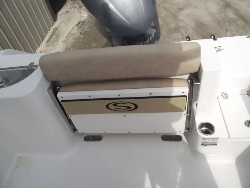Slide: The Image of 2019 Sportsman Open 232 Center Console boat seat and storage compartment. - 30