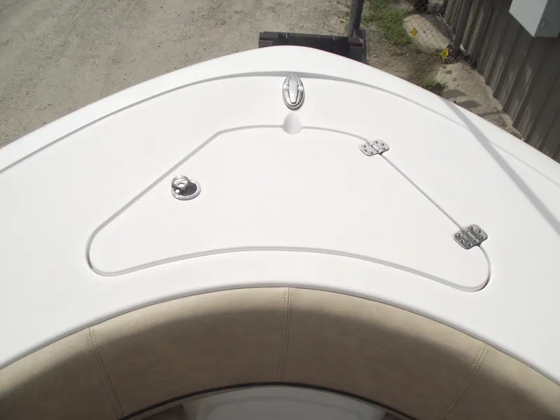 Slide: The Image of 2019 Sportsman Open 232 Center Console boat bow with storage compartment. - 5