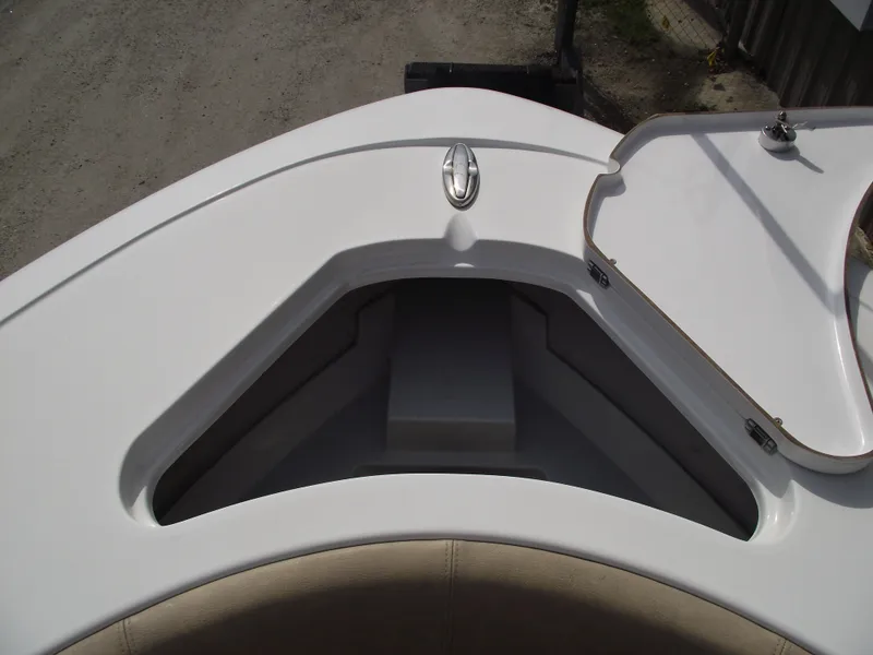 Slide: The Image of 2019 Sportsman Open 232 Center Console boat storage compartment. - 6