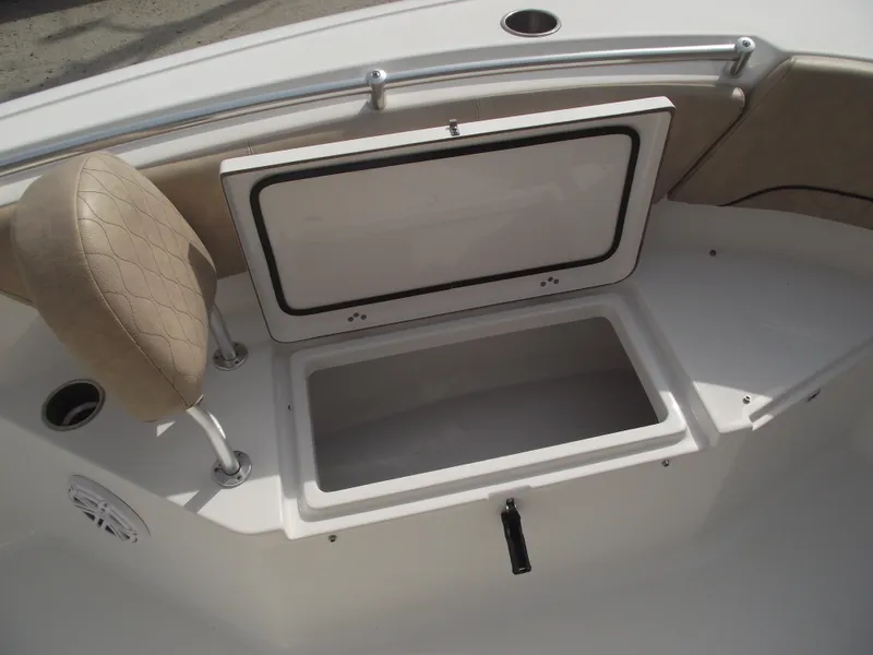 Slide: The Image of 2019 Sportsman Open 232 Center Console boat with open storage compartment. - 9
