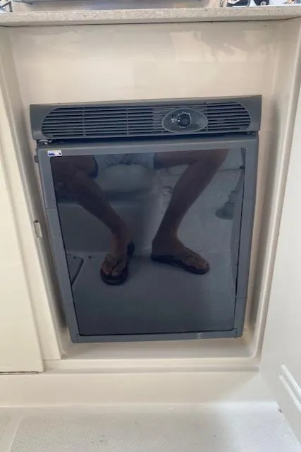 Slide: The Image of Built-in refrigerator on a 2008 Sea Ray 290 Sundeck boat. - 38