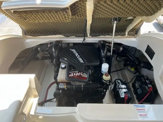 Slide: The Image of 2008 Sea Ray 290 Sundeck engine compartment with Mercury 496 Mag engine and battery. - 44