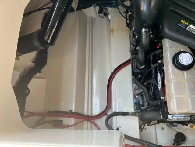 Slide: The Image of Engine compartment of a 2008 Sea Ray 290 Sundeck boat, showing wiring and components. - 48