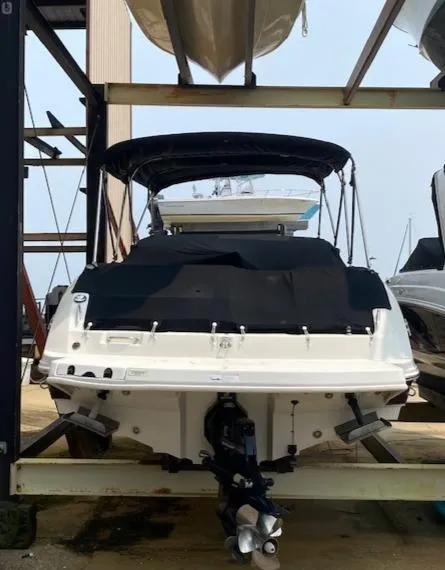 Slide: The Image of 2008 Sea Ray 290 Sundeck boat in storage, rear view. - 5