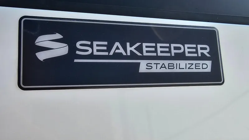 Slide: The Image of Seakeeper Stabilized logo on 2021 Regal 38 SAV boat. - 25