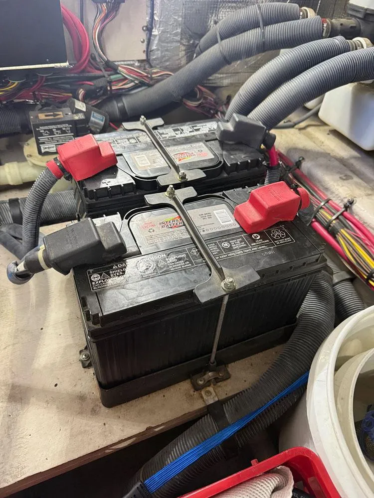 Slide: The Image of Battery setup in a 2003 Sea Ray 390 Motor Yacht engine room. - 13