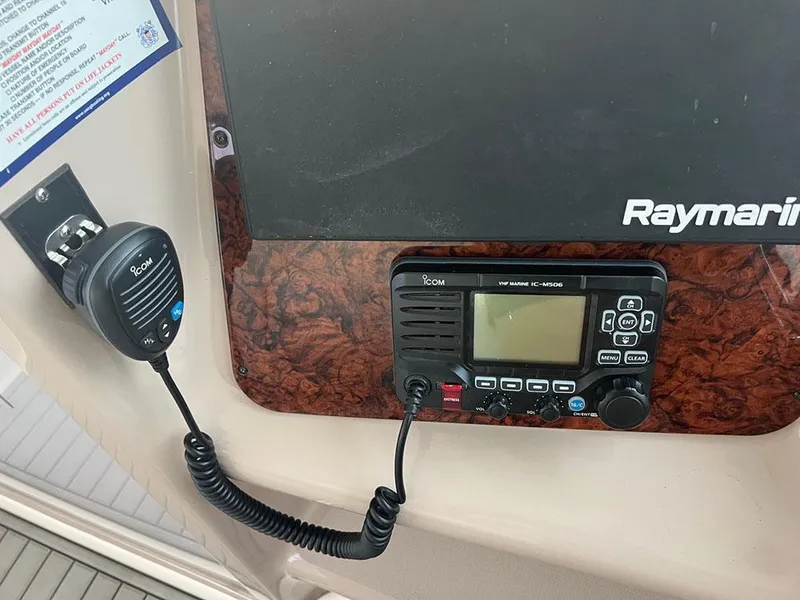 Slide: The Image of VHF marine radio and microphone on 2003 Sea Ray 390 Motor Yacht dashboard. - 20