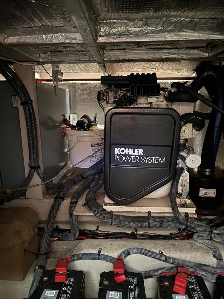 Slide: The Image of Engine room of 2003 Sea Ray 390 Motor Yacht with Kohler power system. - 48