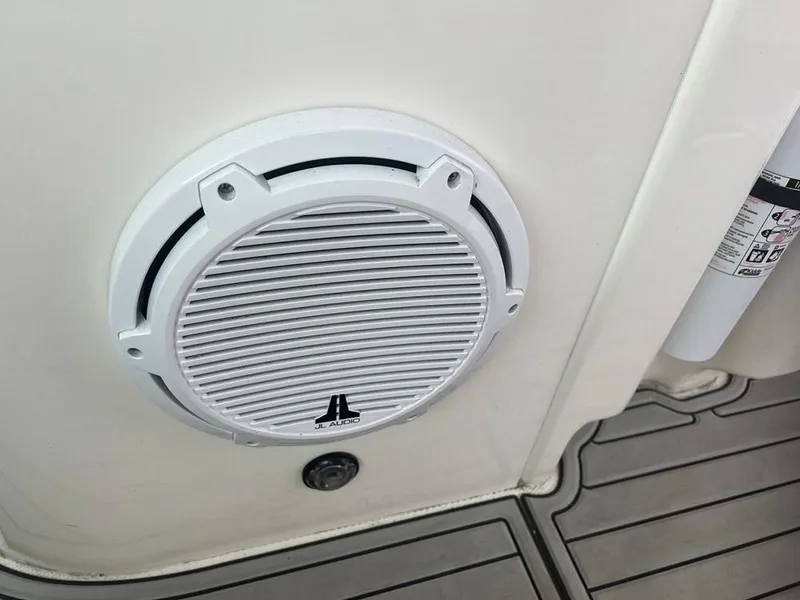Slide: The Image of White JL Audio speaker on 2003 Sea Ray 390 Motor Yacht deck. - 51