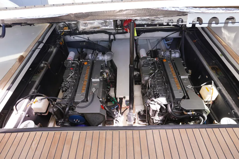 Slide: The Image of Engine compartment of 2002 Little Harbor WhisperJet, showcasing dual engines and detailed mechanical layout. - 10