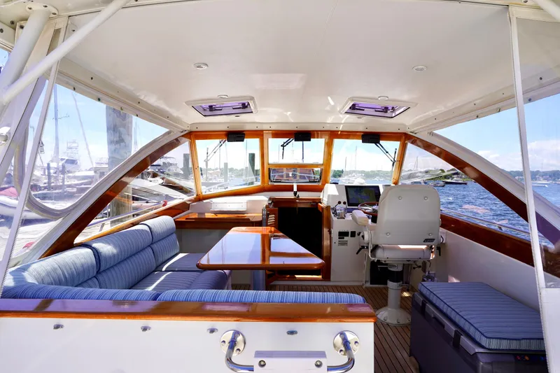 Slide: The Image of Interior of 2002 Little Harbor WhisperJet yacht with seating and navigation area. - 25