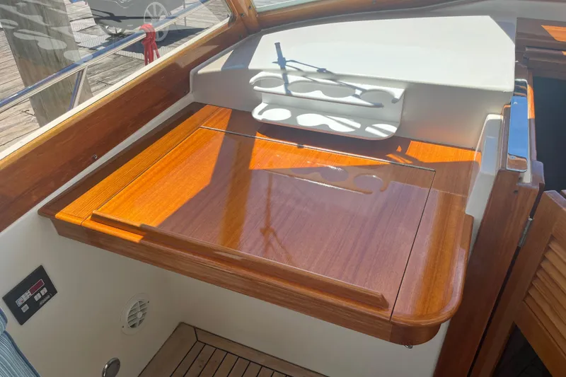 Slide: The Image of Wooden interior detail of a 2002 Little Harbor WhisperJet boat. - 33