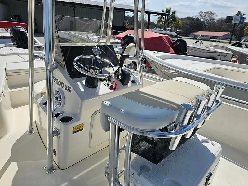 Slide: The Image of 2025 Bulls Bay 2200 XS boat interior with steering console and seating. - 15