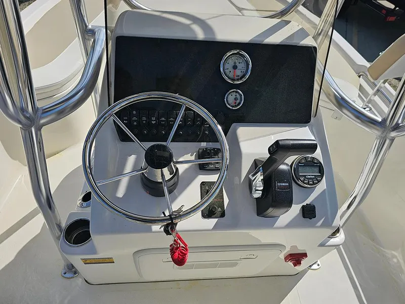 Slide: The Image of Steering console of 2025 Bulls Bay 2200 XS boat with gauges and controls. - 16