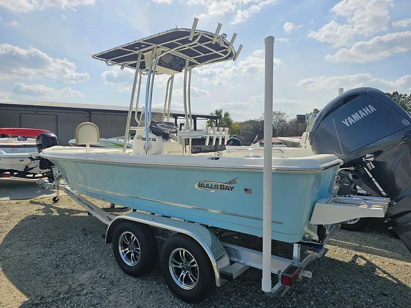Slide: The Image of 2025 Bulls Bay 2200 XS boat on trailer, featuring Yamaha outboard motor. - 3