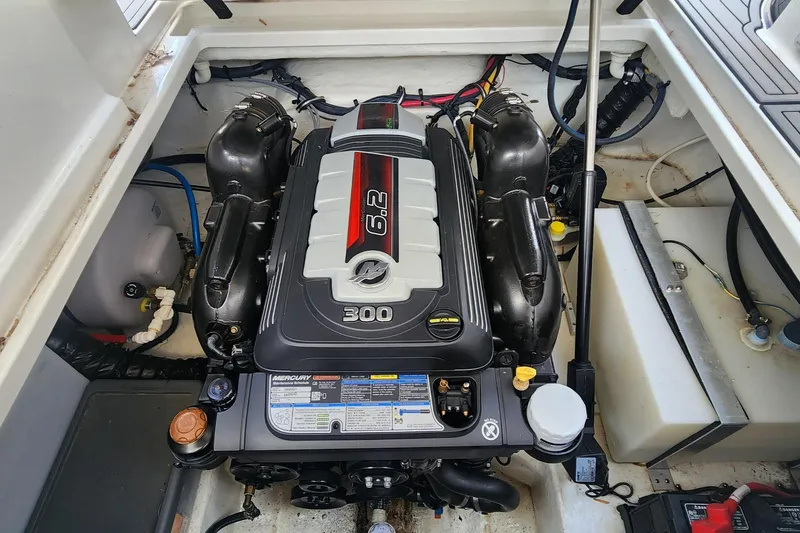 Slide: The Image of Engine compartment of a 2018 Monterey 275 Sport Yacht with a 6.2L MerCruiser engine. - 16