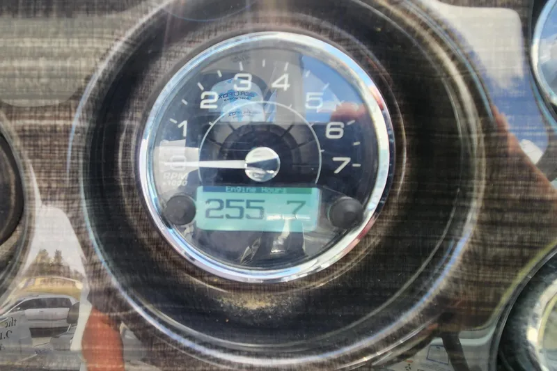 Slide: The Image of Close-up of 2018 Monterey 275 Sport Yacht tachometer displaying 255.7 hours. - 18