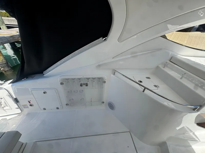 Slide: The Image of 2023 Schaefer 375 HT boat interior with sleek white design and modern features. - 10