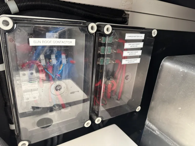 Slide: The Image of Electrical panel of 2023 Schaefer 375 HT boat with labeled components. - 36