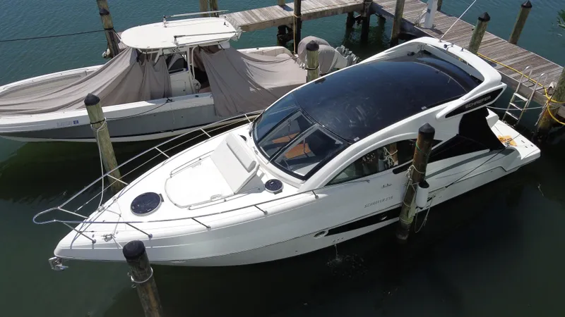 Slide: The Image of 2023 Schaefer 375 HT yacht docked at marina, aerial view. - 4