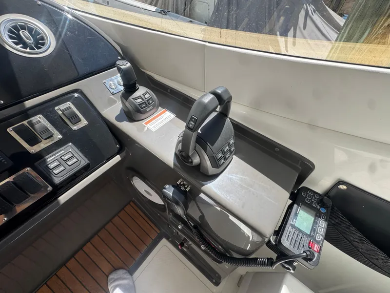 Slide: The Image of Control panel of 2023 Schaefer 375 HT yacht with modern navigation equipment. - 44