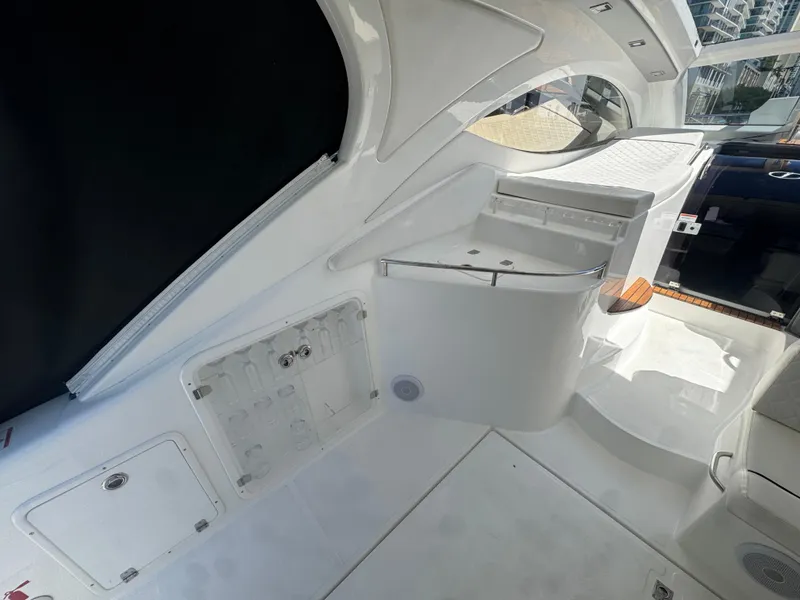 Slide: The Image of 2023 Schaefer 375 HT yacht interior, featuring sleek white design and modern amenities. - 9