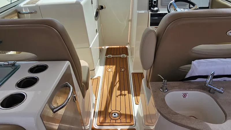 Slide: The Image of Interior of 2019 Sailfish 325 DC boat with teak flooring and seating. - 46