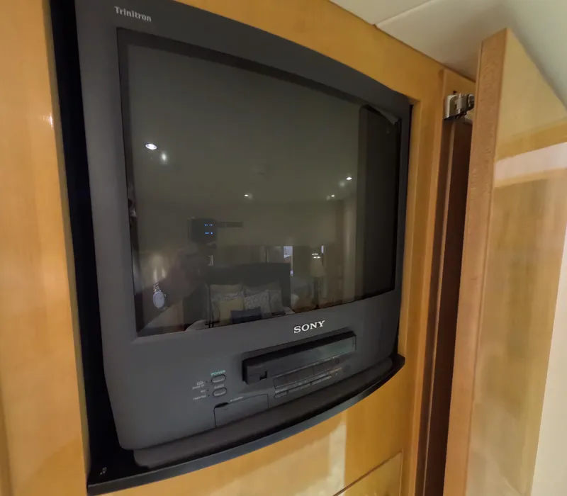 Slide: The Image of Sony Trinitron TV inside 2001 Hatteras 55 Convertible yacht cabinet. - 29