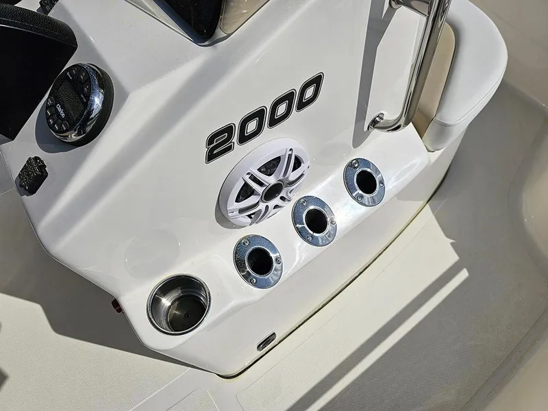Slide: The Image of Bulls Bay 2000 boat console with cup holders and speaker, 2025 model. - 15