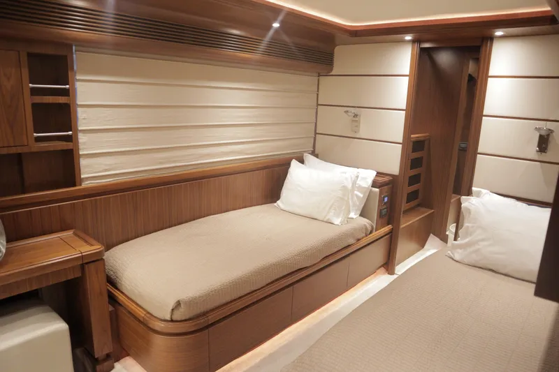 Slide: The Image of Luxurious cabin interior of 2016 Custom Line 97 yacht with elegant wood finishes. - 22