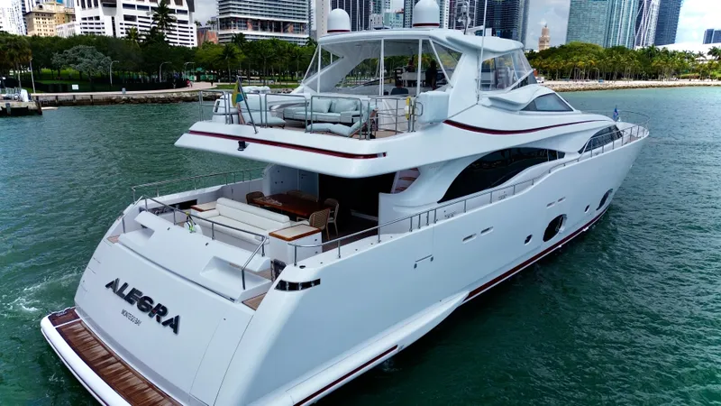 Slide: The Image of Luxurious 2016 Custom Line 97 yacht cruising near city skyline. - 5