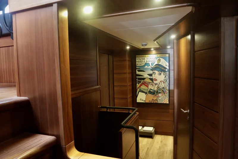 Slide: The Image of Luxurious wooden interior of 2016 Custom Line 97 yacht with modern artwork. - 10