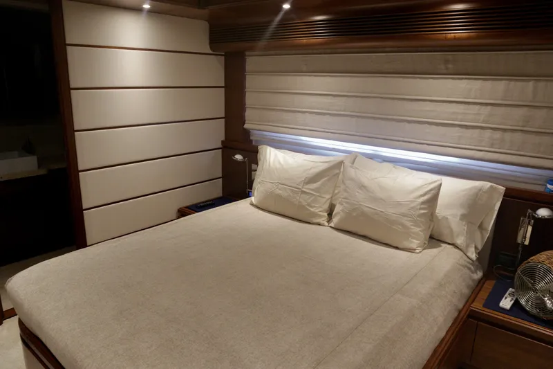 Slide: The Image of Luxurious bedroom interior of 2016 Custom Line 97 yacht with elegant bedding and ambient lighting. - 24