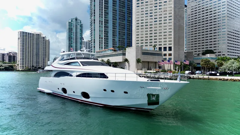 Slide: The Image of Luxurious 2016 Custom Line 97 yacht cruising in a city harbor with skyscrapers. - 4