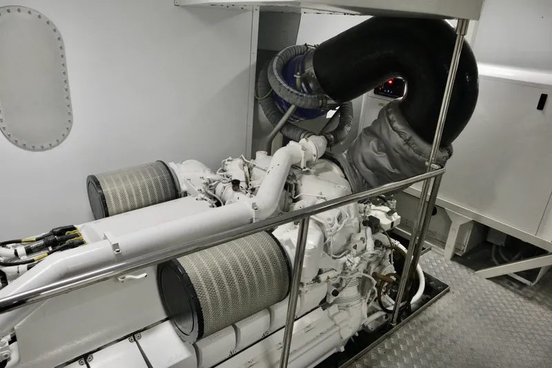 Slide: The Image of Engine room of 2016 Custom Line 97 yacht, featuring advanced machinery and components. - 33