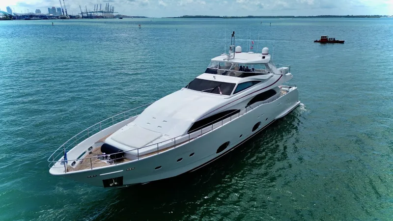 Slide: The Image of Luxurious 2016 Custom Line 97 yacht cruising on calm blue waters. - 6