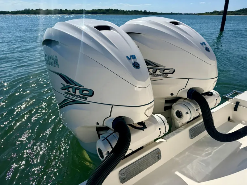 Slide: The Image of Twin Yamaha XTO outboard engines on a 2020 Cobia 350 Center Console boat. - 14