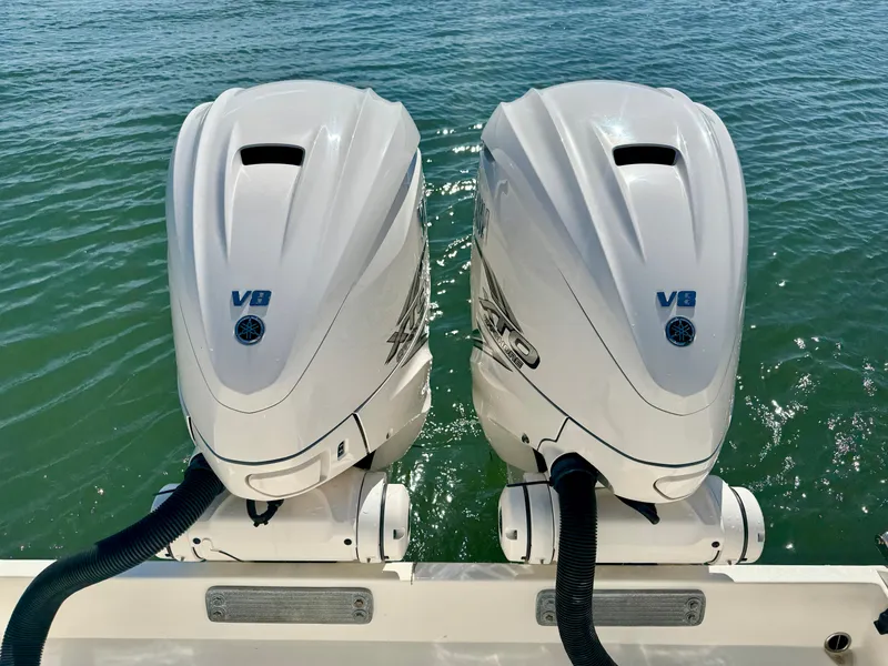 Slide: The Image of Twin V8 engines on a 2020 Cobia 350 Center Console boat. - 15